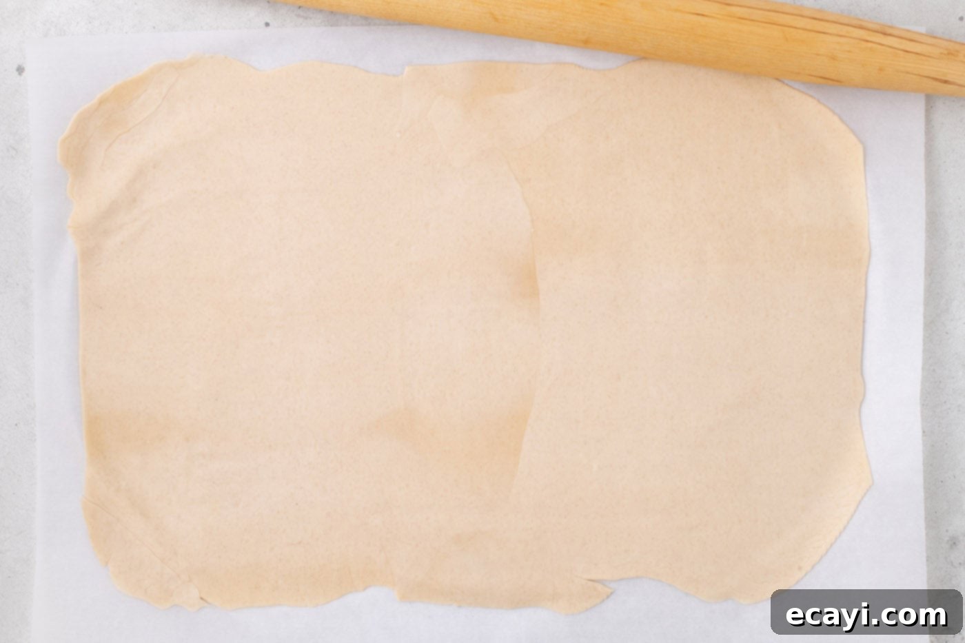 Family Sized Sheet Pan Pumpkin Pie 7 rolling two premade pie crusts into a single rectangle