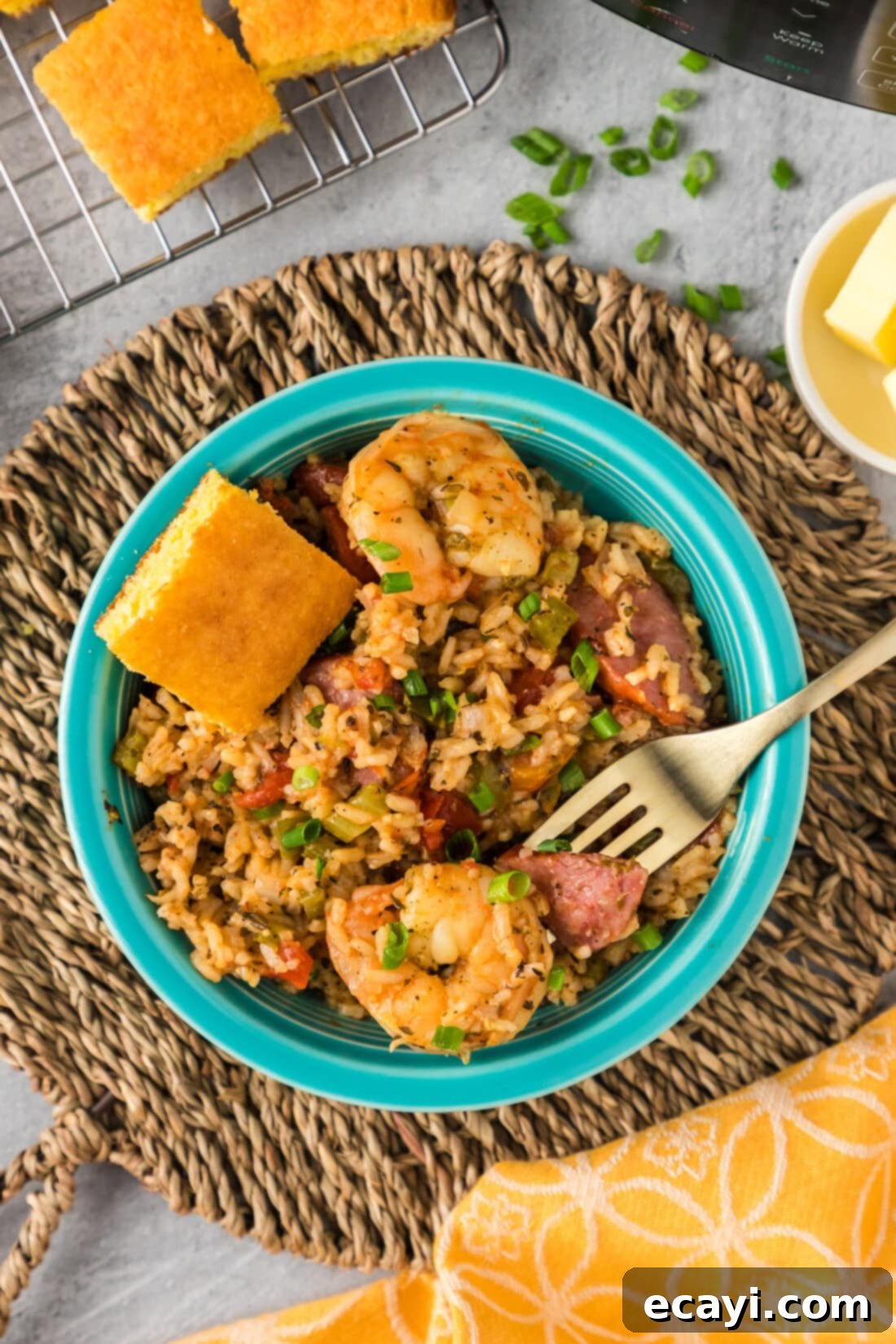 Easy Instant Pot Jambalaya 3 Bowl of Instant Pot Jambalaya with a fork resting on top