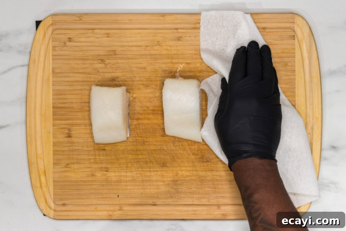 Crisp Skin Pan Seared Chilean Sea Bass 5 hand patting chilean sea bass dry with paper towels