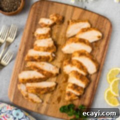 Flawless Sous Vide Chicken Breast 10 Sliced Sous Vide Chicken Breast served on a wooden platter