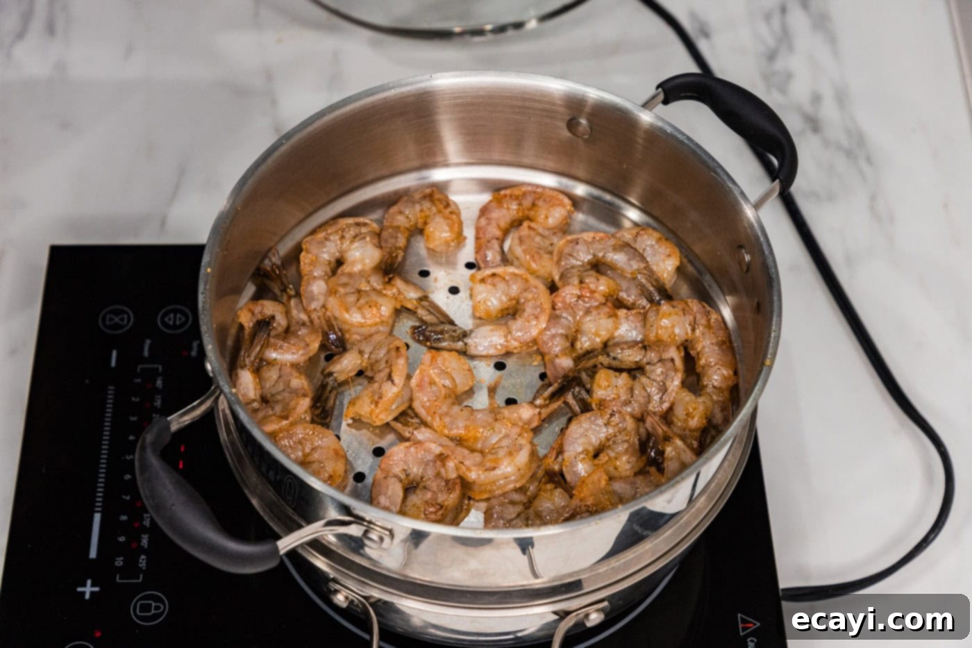 Tender Steamed Shrimp 6 seasoned shrimp in a steamer pot