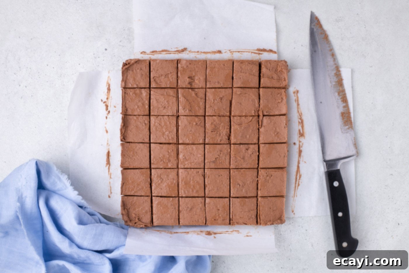 Cool Whip Treats 9 The chilled chocolate mixture has been sliced into neat squares within the baking pan.