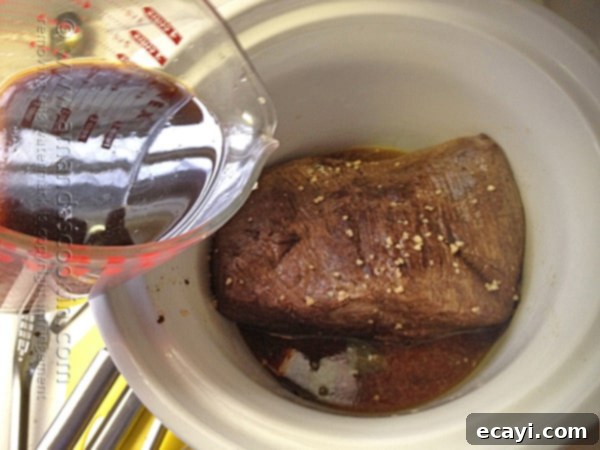 Velvet Brandy Pot Roast 9 Pour the liquids over the meat in the crockpot