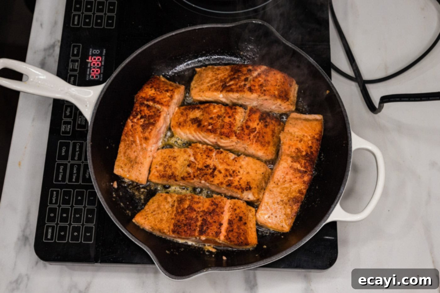 Silken Salmon Perfection 9 pan seared salmon in a skillet