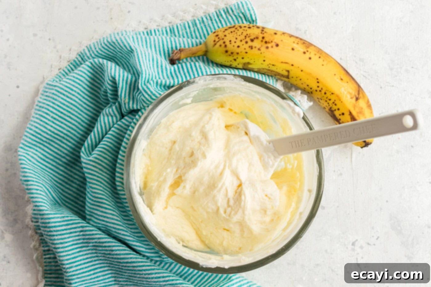Effortless Banana Cake 10 finished banana frosting in a bowl, ready to be spread on the cake