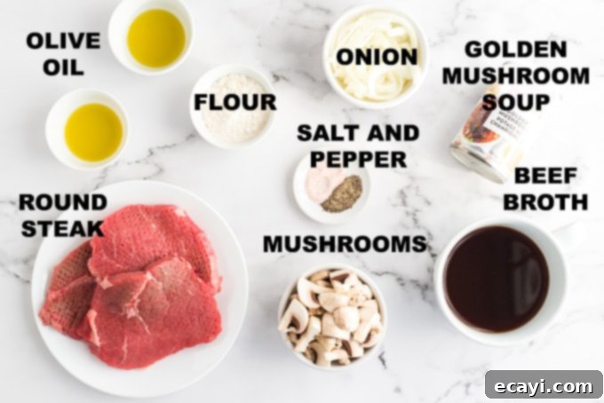 Classic Oven-Braised Swiss Steak 2 Ingredients laid out for making oven Swiss steak, including beef, flour, onions, mushrooms, beef broth, and golden mushroom soup.
