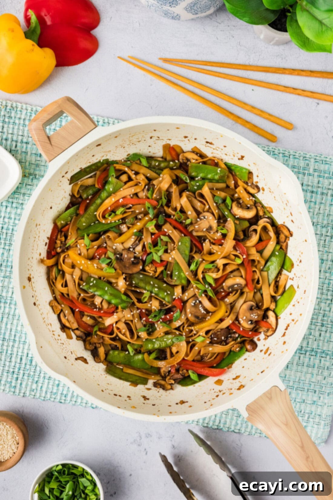 Savory Vegetable Lo Mein 3 Close-up of Vegetable Lo Mein being stir-fried in a large skillet, showing colorful ingredients