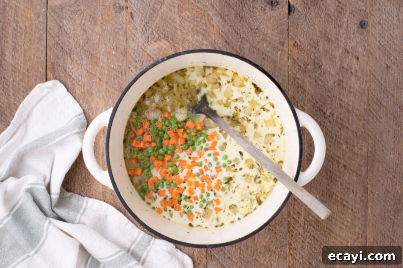 Hearty Chicken Pot Pie Pasta 9 carrots, peas, and heavy cream added to pot with the creamy sauce and veggies