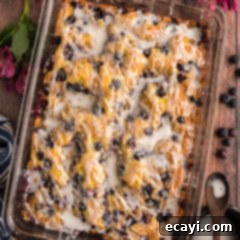 Tender Blueberry Cake with Zesty Lemon Glaze 12 Glazed Lemon Blueberry Cake in a glass baking dish