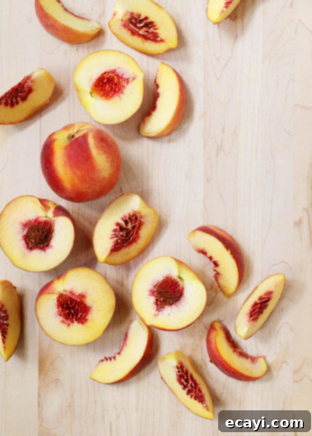 Bourbon-Kissed Peach Crumble 3 Fresh peaches that will be used to make an aromatic Bourbon Peach Crisp. // FoodNouveau.com