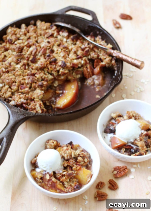 Bourbon-Kissed Peach Crumble 5 This aromatic Bourbon Peach Crisp combines classic southern ingredients to produce a dessert that marries jammy fruits and a crunchy topping. // Bourbon Peach Crisp // FoodNouveau.com