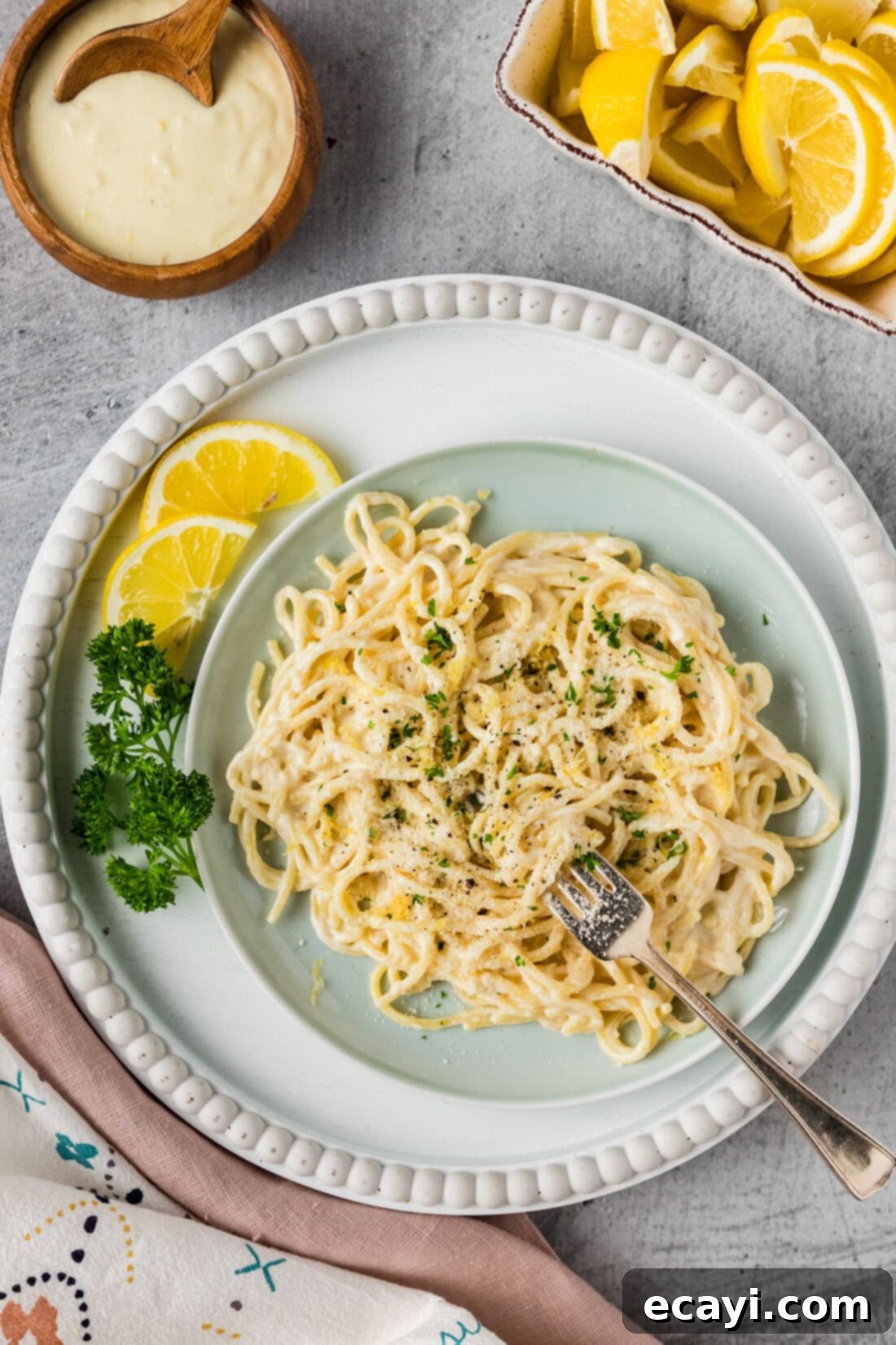 Zesty Lemon Cream 8 Plate of pasta generously covered in Lemon Cream Sauce, ready to be enjoyed.