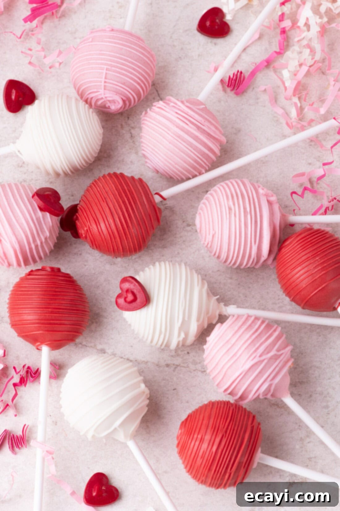 Sweetheart Cake Pops 2 Valentine Cake Pops elegantly arranged on a table, showcasing their delightful colors