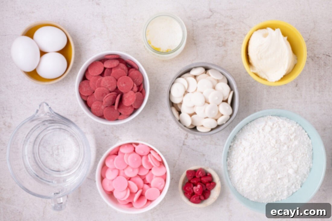 Sweetheart Cake Pops 4 A collection of ingredients laid out on a clean surface, ready for making Valentine Cake Pops