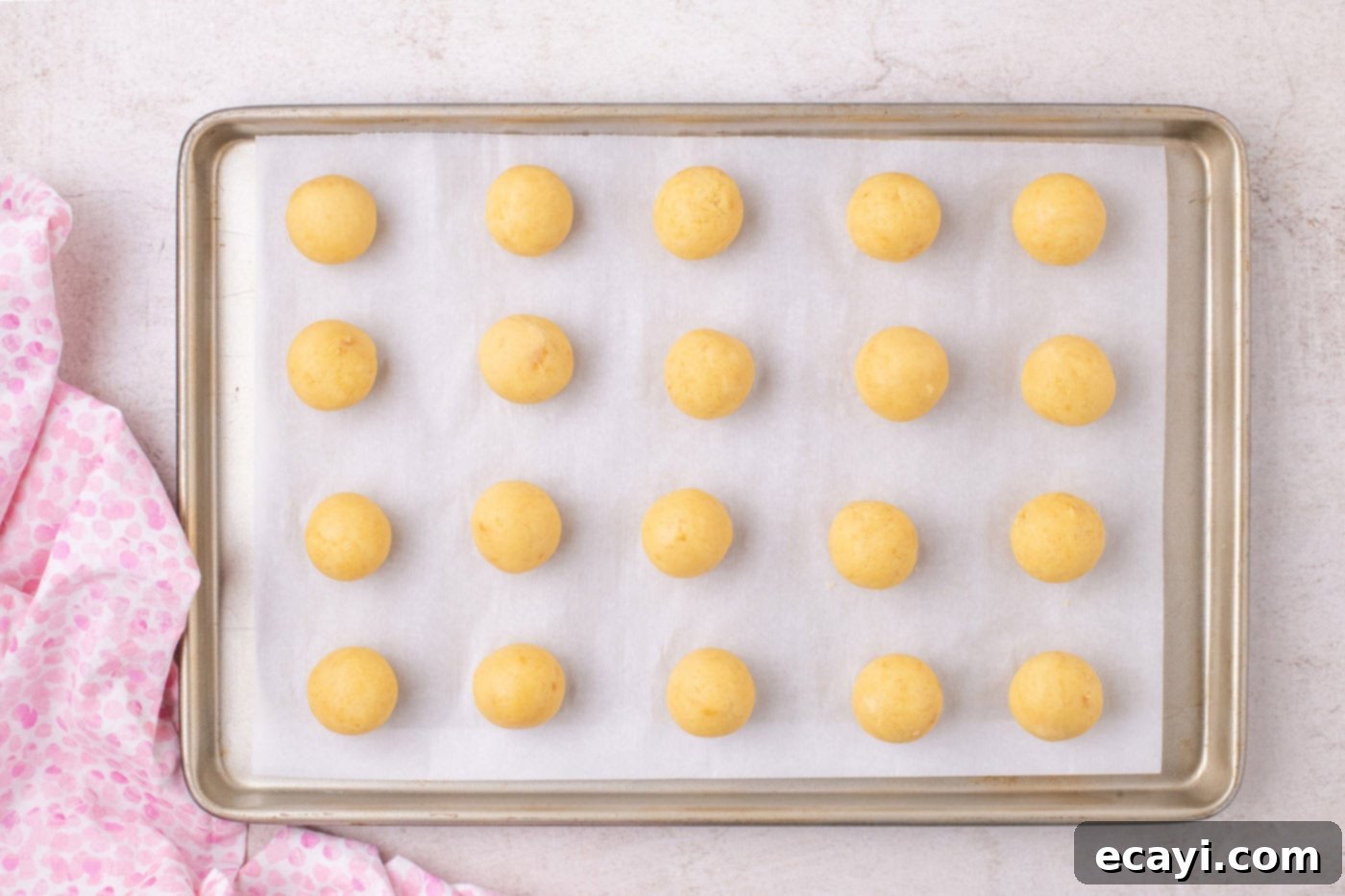 Sweetheart Cake Pops 9 Perfectly rolled, smooth cake balls arranged on a baking sheet, ready for chilling