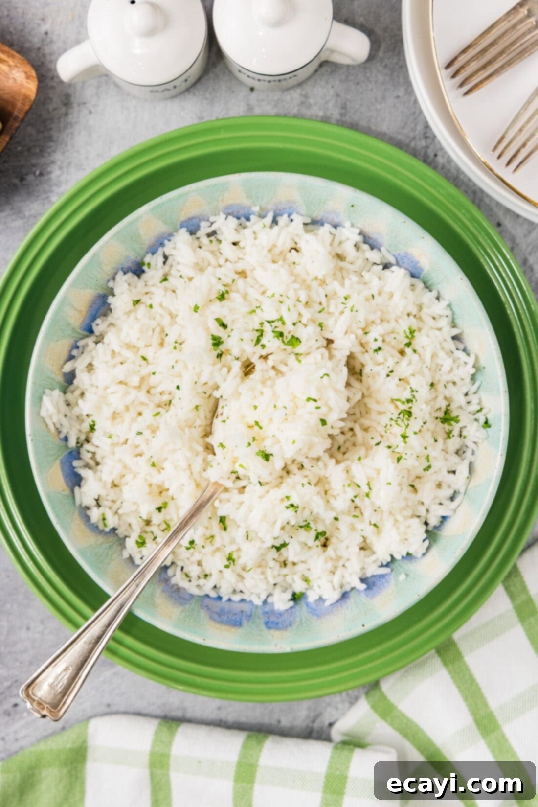 Pasta-Style Rice 3 Plate of Pasta Method Rice with a spoon in it