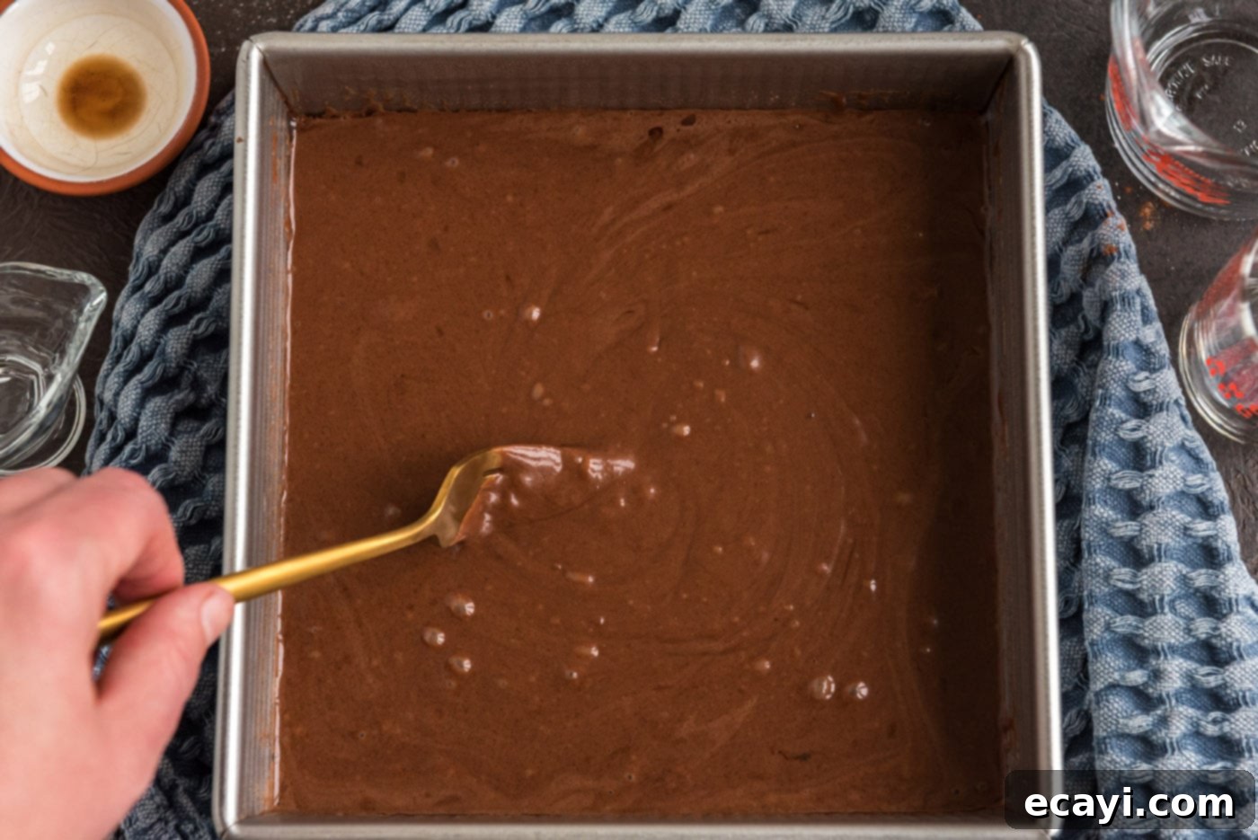 Miracle Mix Cake 12 stirred chocolate cake batter in a baking dish