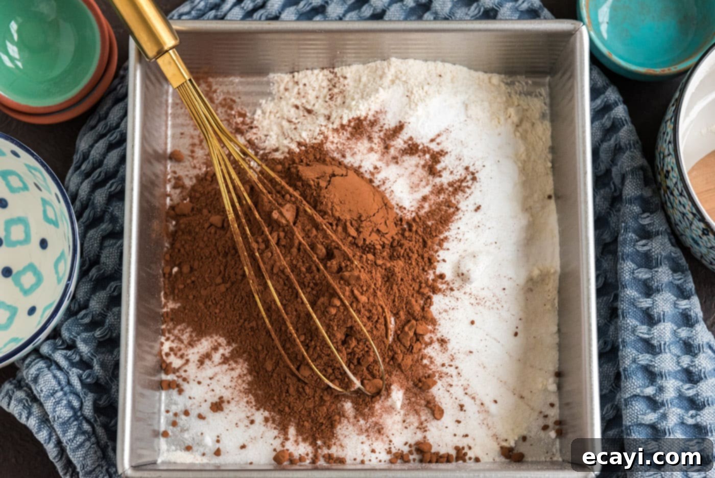 Miracle Mix Cake 5 whisking cocoa powder with flour, sugar, salt, and baking powder