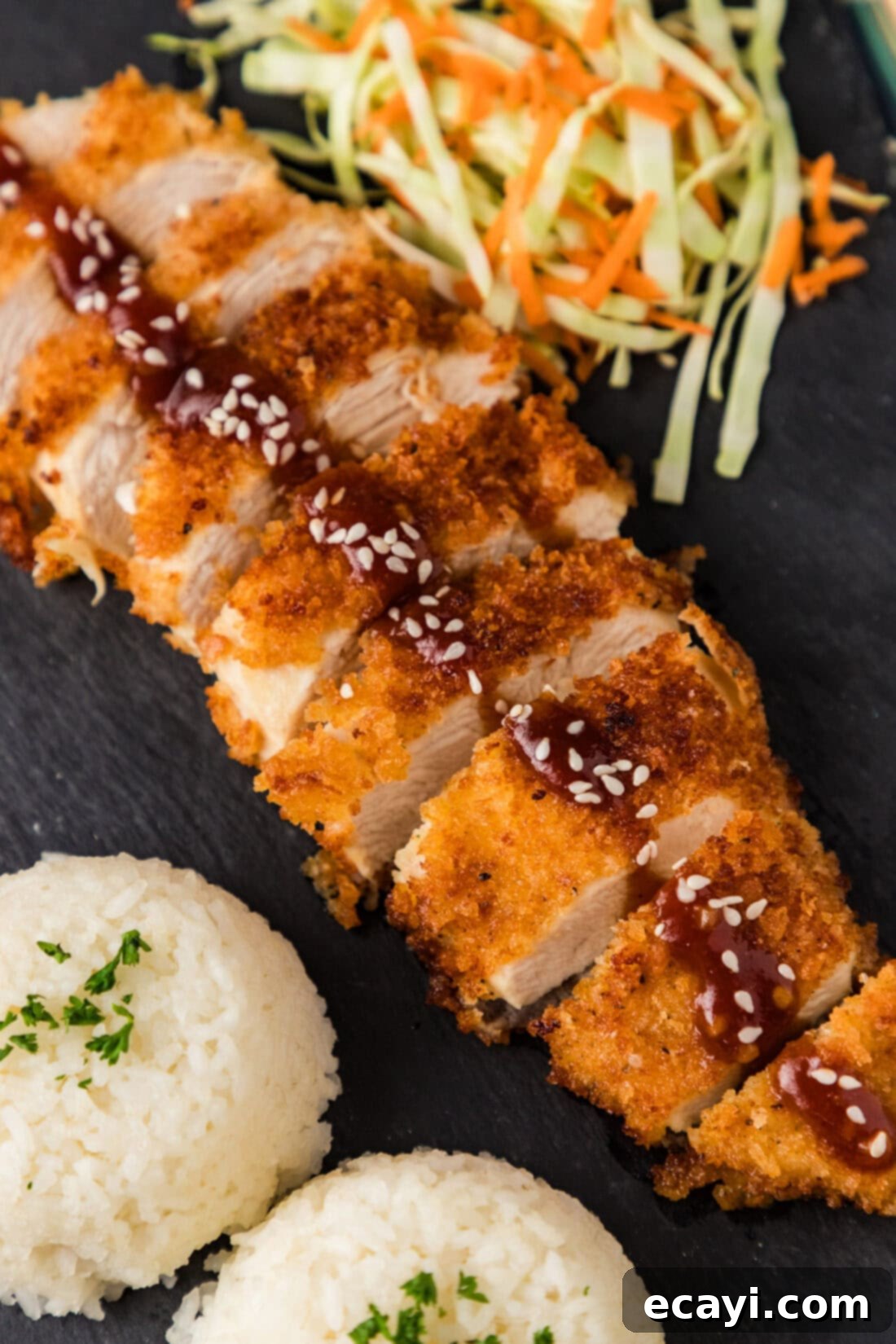 Golden Panko Chicken Cutlet 2 Close up photo of Chicken Katsu cut into slices on a platter