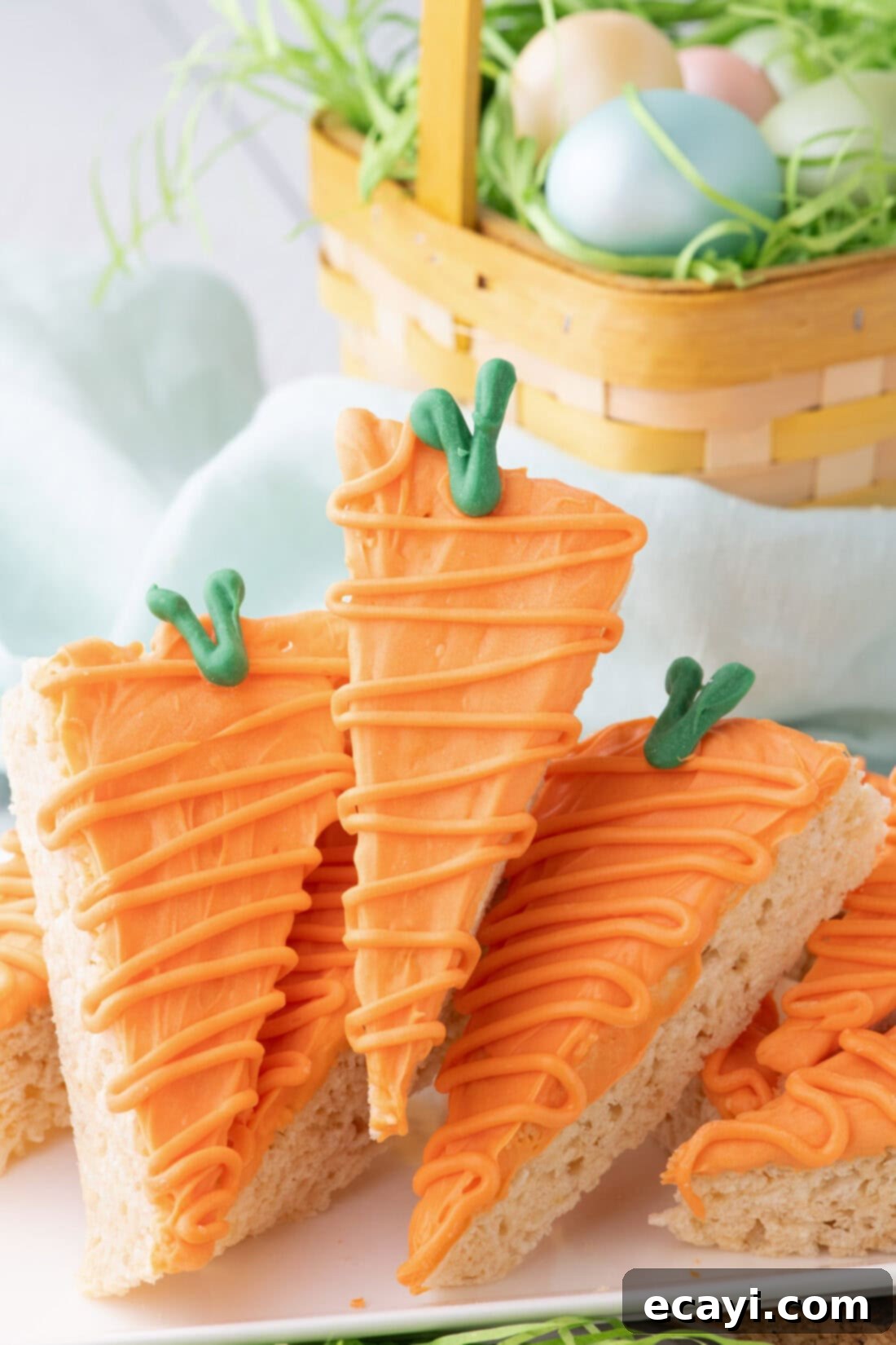 Carrot Cake Krispie Squares 2 A platter overflowing with perfectly crafted Carrot Rice Krispie Treats, ready for Easter
