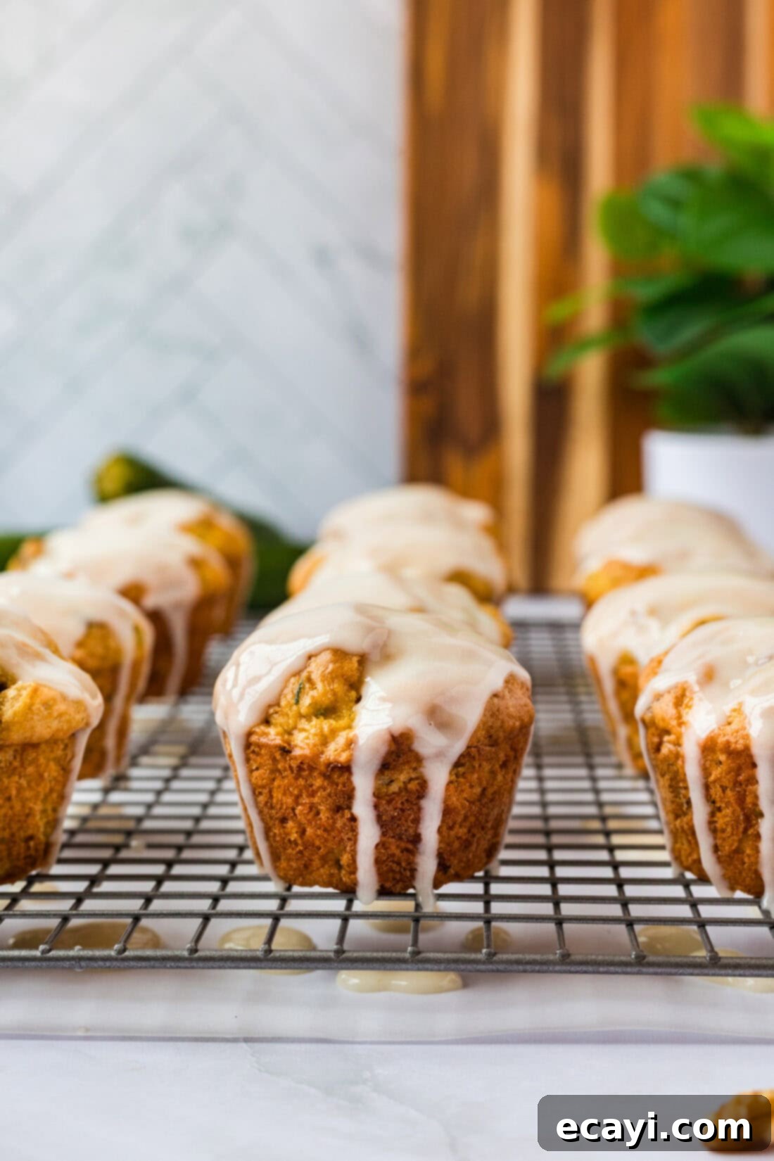 Quick Zucchini Muffins 2 Shortcut Zucchini Muffins on a wire rack