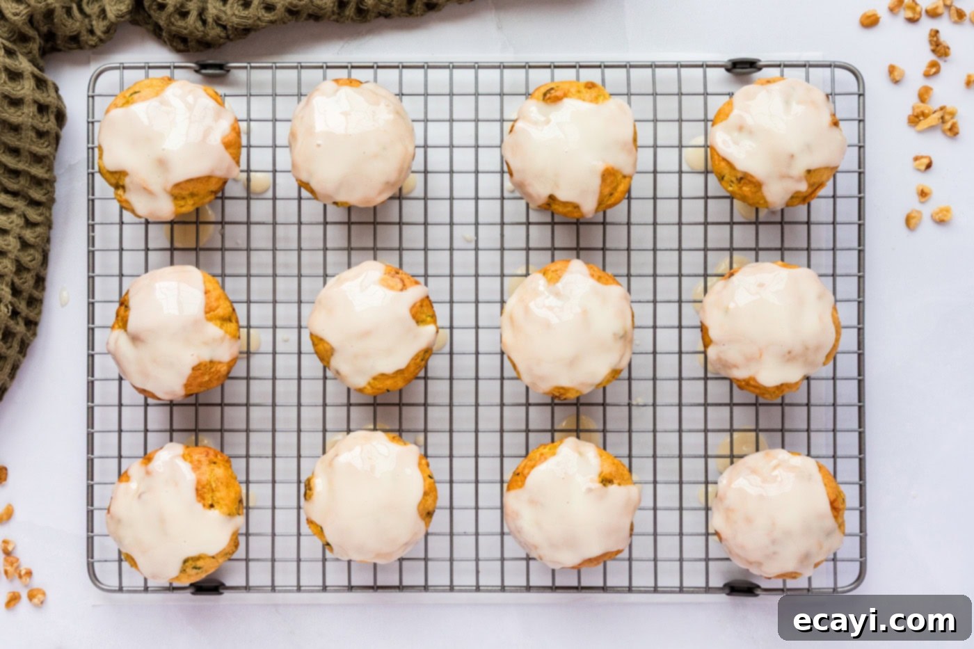 Quick Zucchini Muffins 10 sour cream glaze on top of zucchini muffins