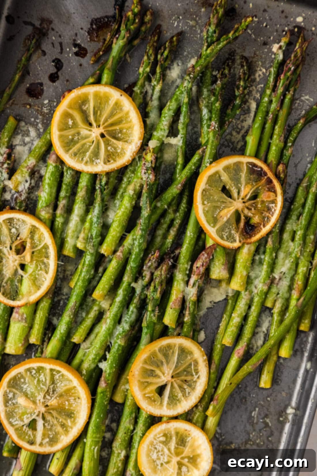 Bright Lemon Asparagus 2 Close up photo of Lemon Asparagus on a sheet pan