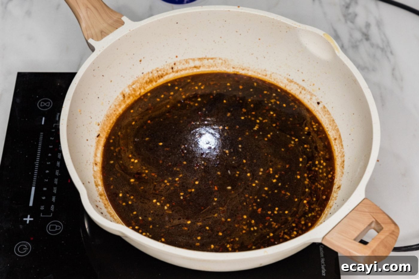 Glazed Mongolian Shrimp 11 Mongolian sauce in a skillet