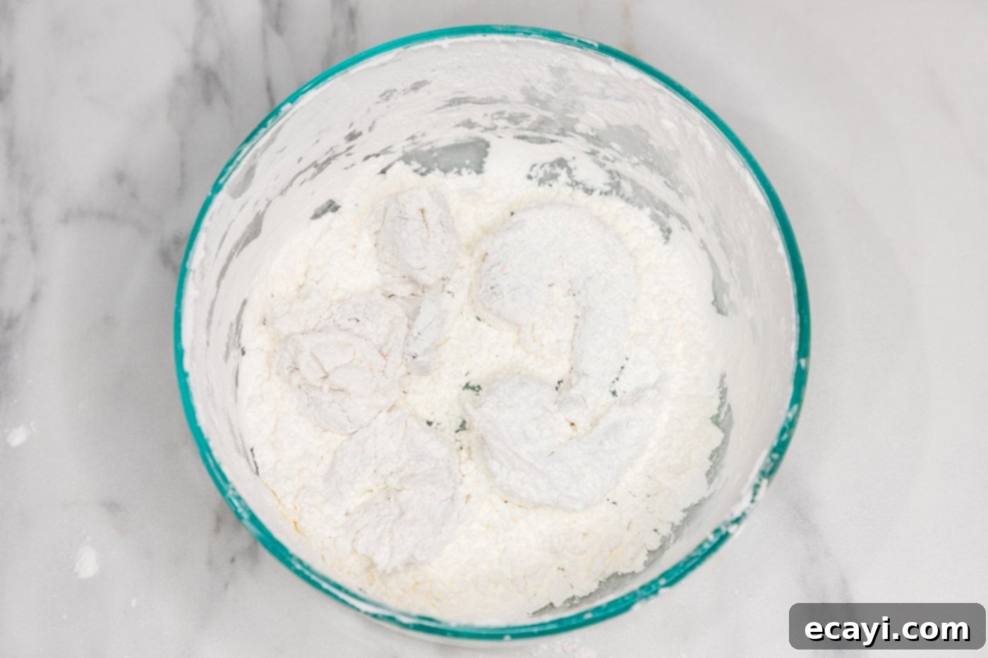 Glazed Mongolian Shrimp 7 flour dredged shrimp in a bowl