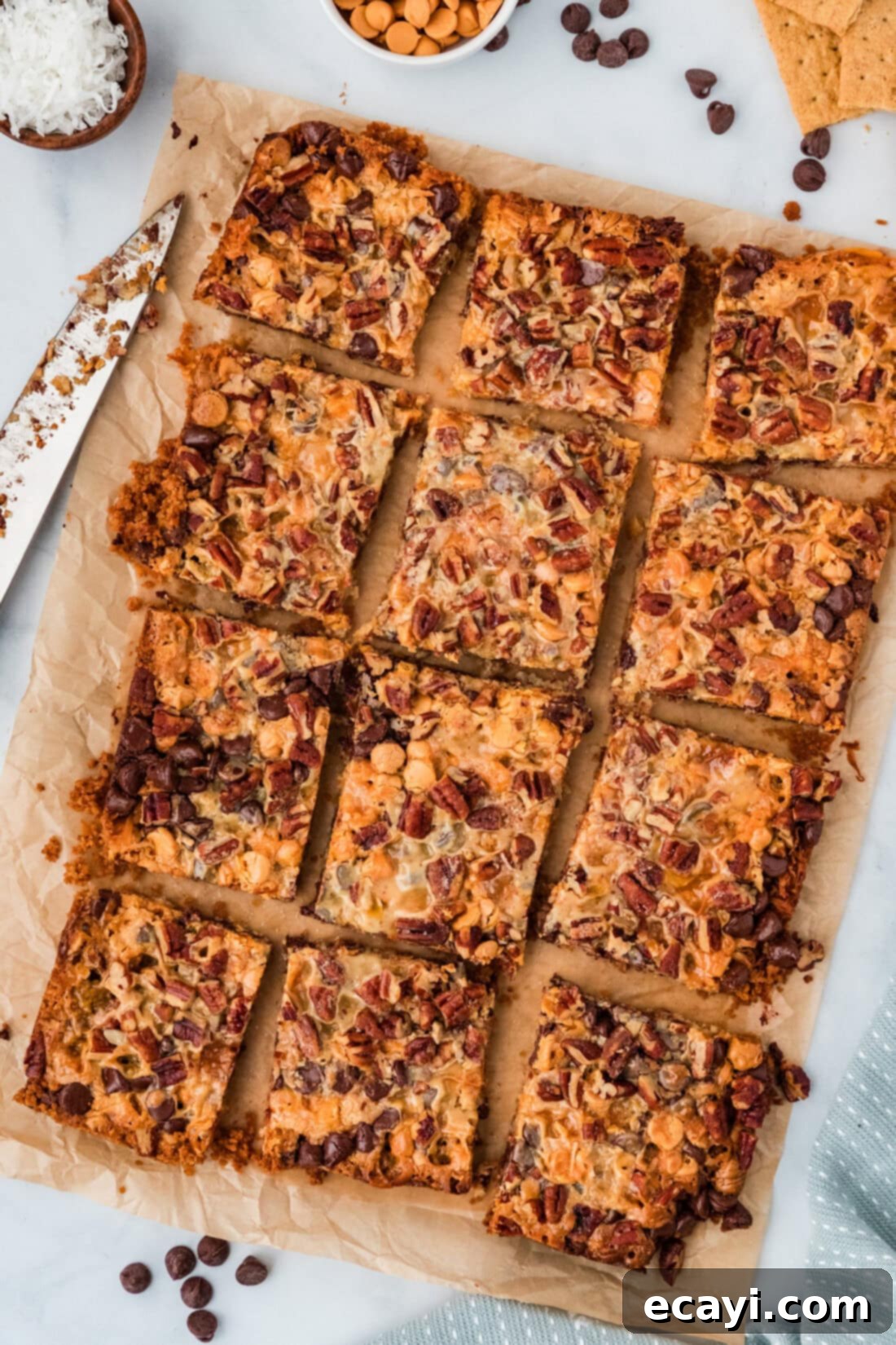 Pure Magic Dessert Bars 2 Golden-brown Magic Bars cut into perfect squares, ready to serve.