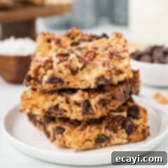 Pure Magic Dessert Bars 13 Close up photo of a stack of Magic Bars, showing the delicious layers and texture.