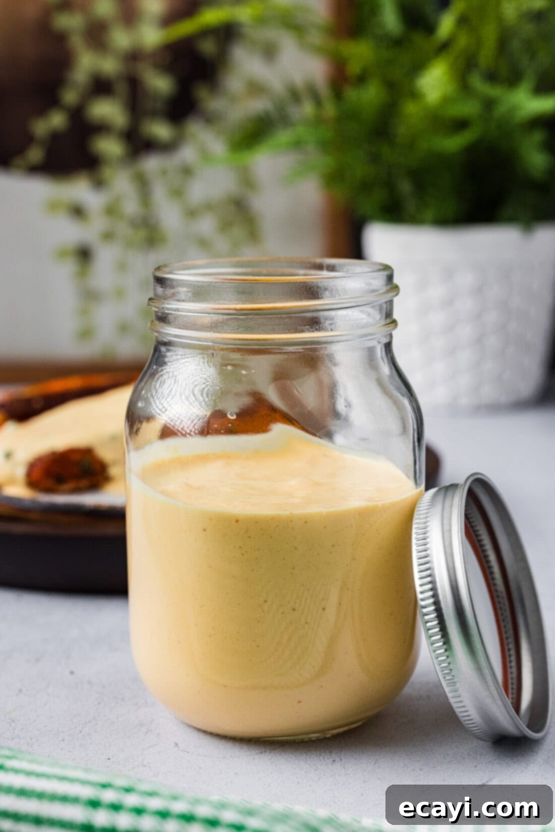 Classic Remoulade 3 A glass jar filled with fresh, homemade Remoulade Sauce, ready for serving or storage.