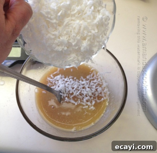 Effortless Golden Coconut Cake 4 Vintage Recipe: Lazy Daisy Cake - Amanda Formaro of Amanda's Cookin', displaying the moist cake texture.