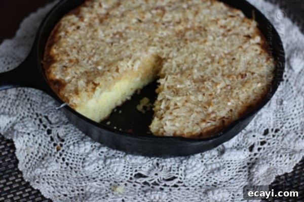 Effortless Golden Coconut Cake 5 Vintage Recipe: Lazy Daisy Cake - Amanda Formaro of Amanda's Cookin', showing a close-up of the topping.