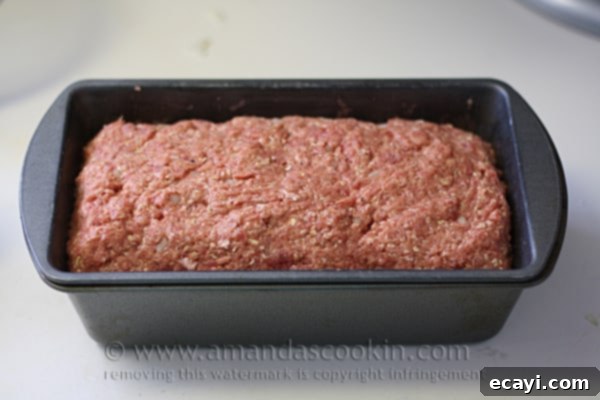 Quaker Oats Ultimate Meatloaf 5 A photo of unbaked Quaker oats meatloaf in loaf pan.