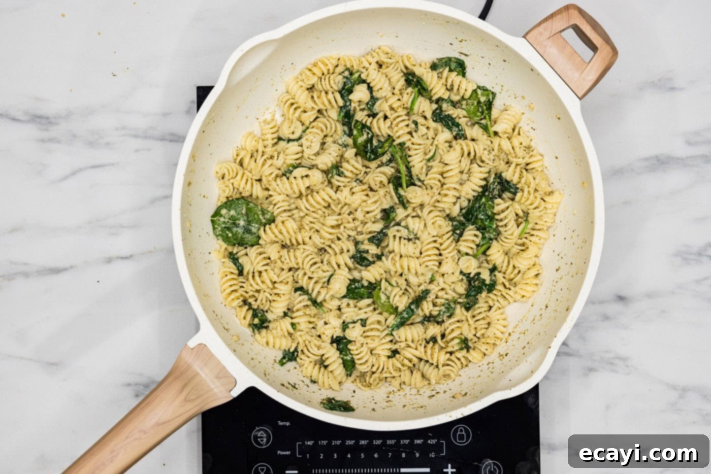 Pesto Perfection 8 overhead of pesto pasta in a skillet, ready to serve
