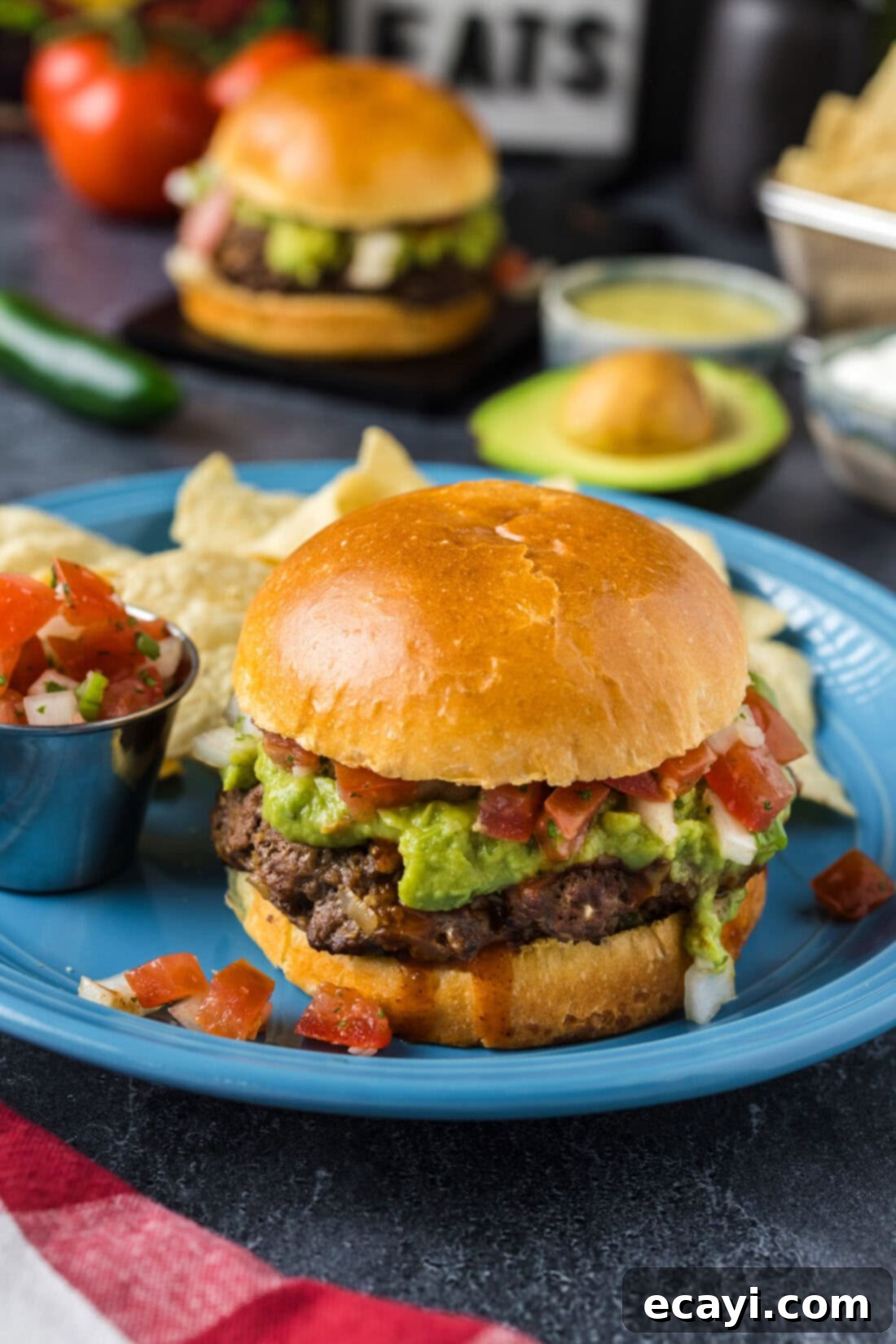 Taco Burger Fusion 10 A single Taco Burger on a white plate, ready to be enjoyed, with its vibrant toppings clearly visible.