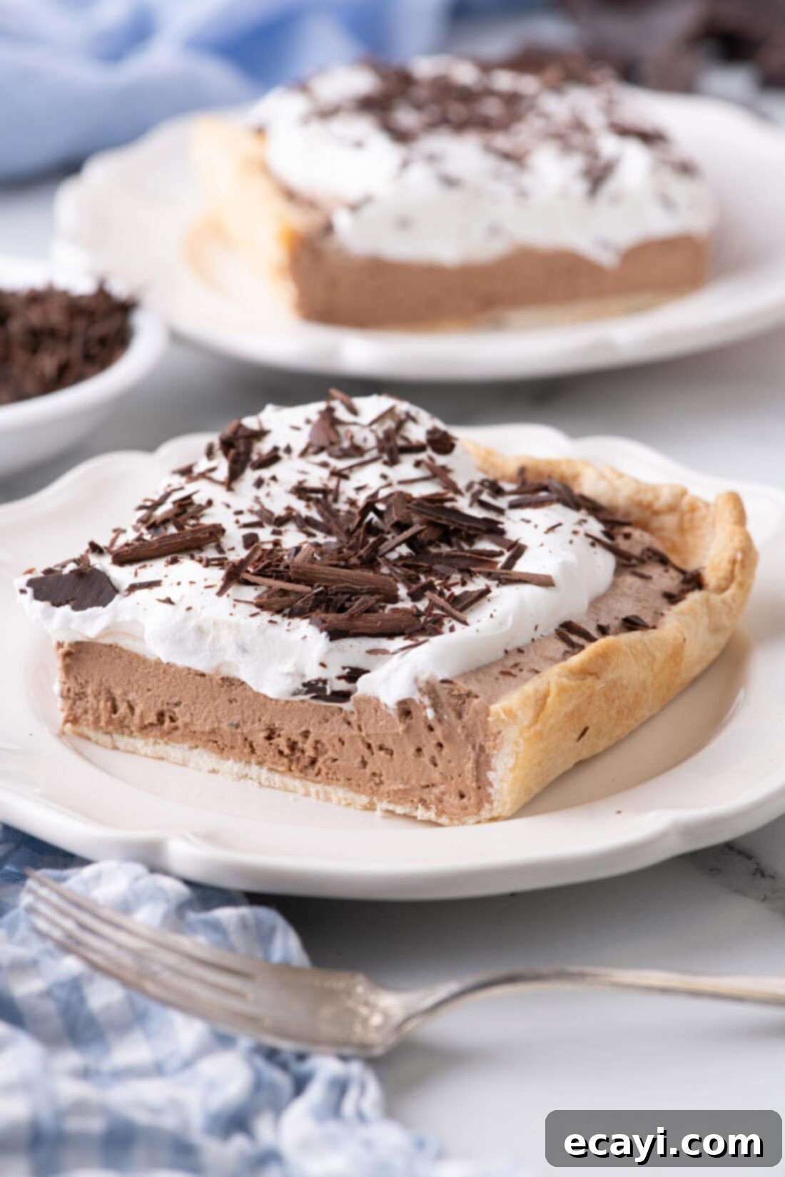 Ultimate French Silk Sheet Pie 2 Slice of French Silk Slab Pie on a plate, showcasing its rich layers