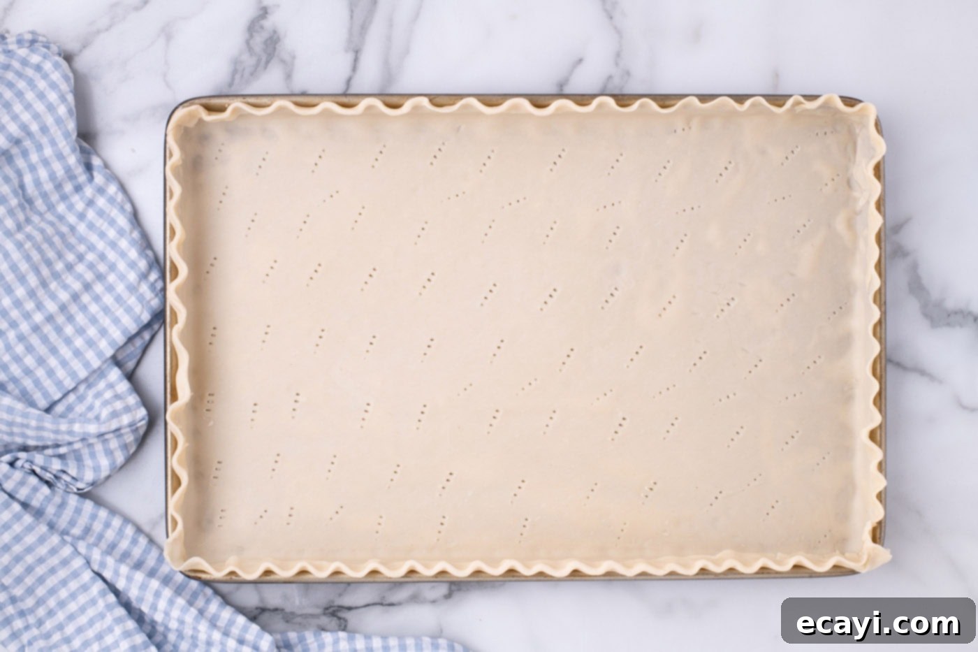 Ultimate French Silk Sheet Pie 8 pie crust with elegant fluted edges in a jelly roll pan
