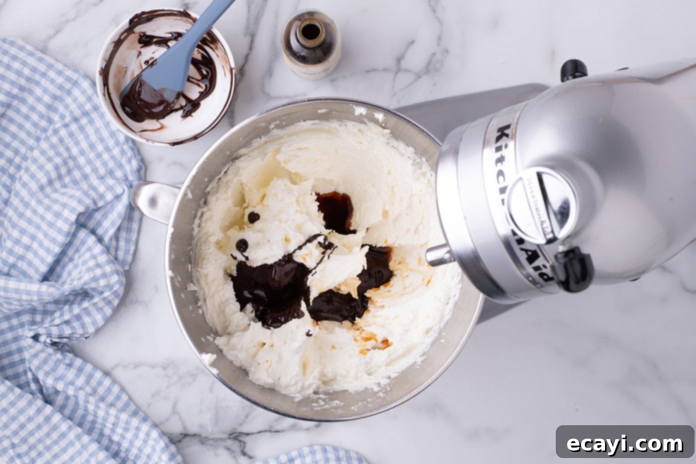 Ultimate French Silk Sheet Pie 9 cooled melted chocolate being added to the butter and sugar in a stand mixer