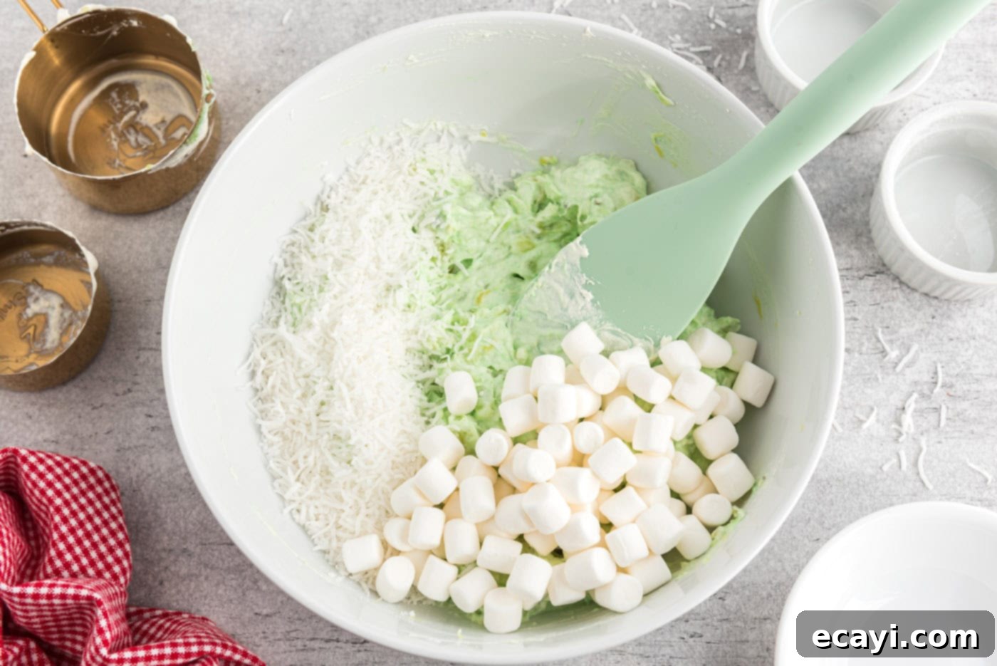 Pistachio Pineapple Delight 7 mini marshmallows and flaked coconut added to pistachio pudding