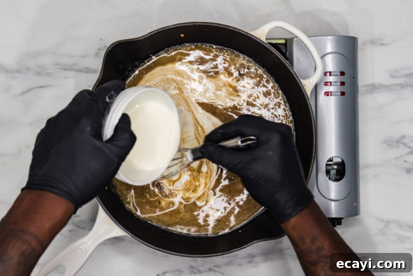 Delicate Veal Cutlets 6 whisking heavy whipping cream, wine, lemon juice, and chicken base in a skillet to form the sauce