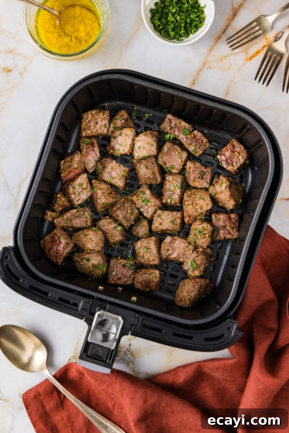 Ultimate Air Fryer Steak Bites 7 Air Fryer Steak Bites in an Air Fryer basket