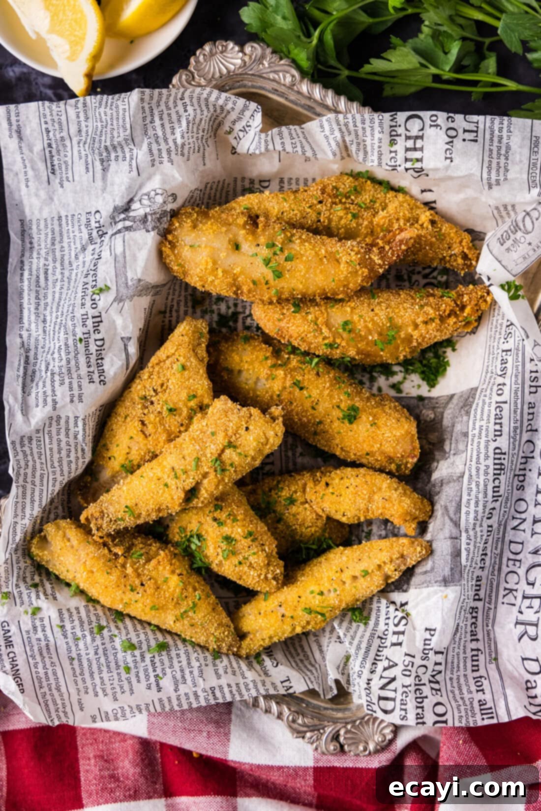 Golden Crispy Perch 8 Fried Perch in a basket lined with parchment paper