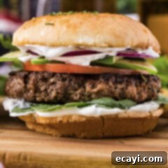 Crafted Lamb Burgers 9 Close up photo of a juicy Lamb Burger with fresh toppings