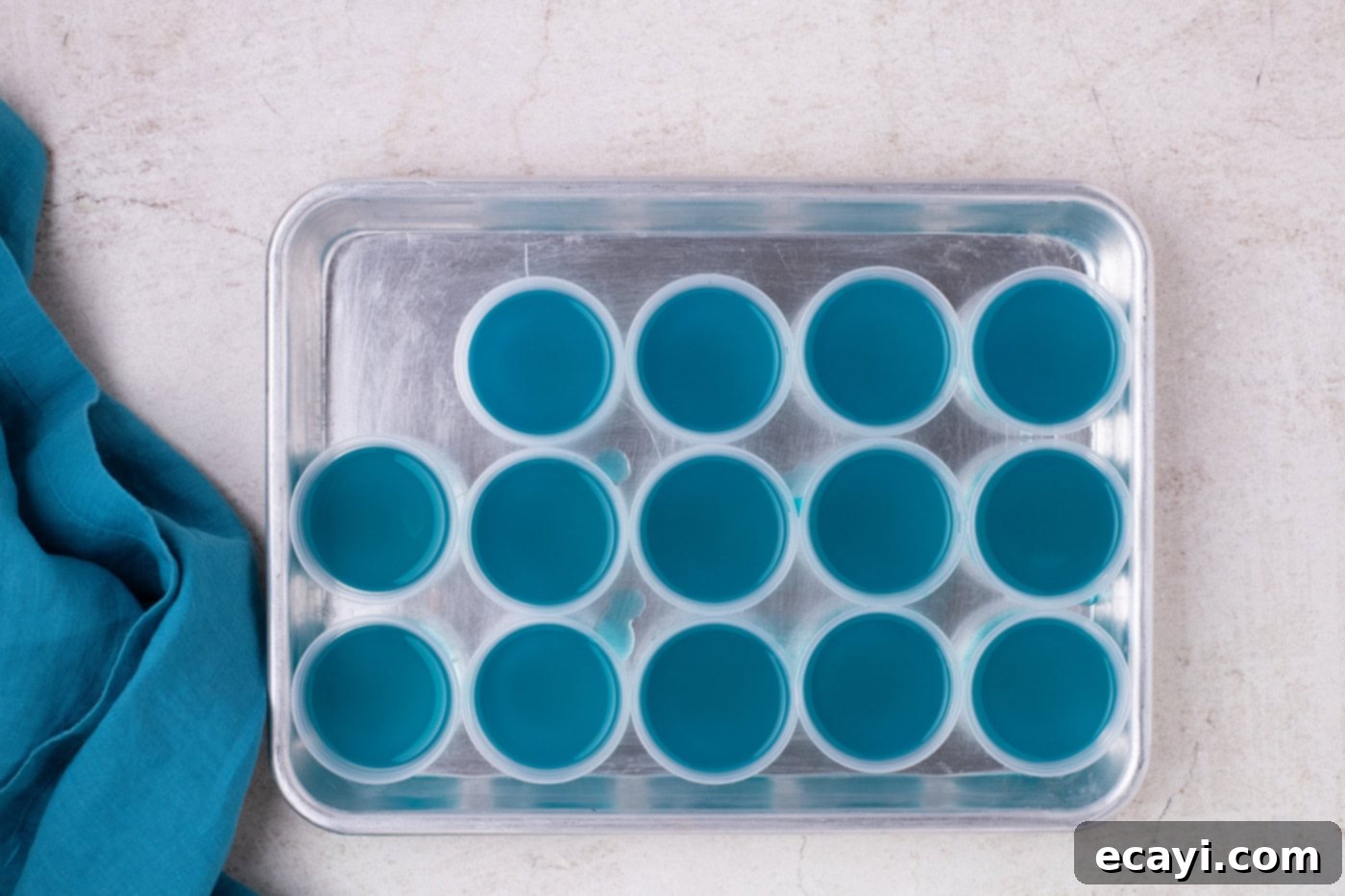 Blue Lagoon Jello Shooters 7 shot glasses filled with blue jello