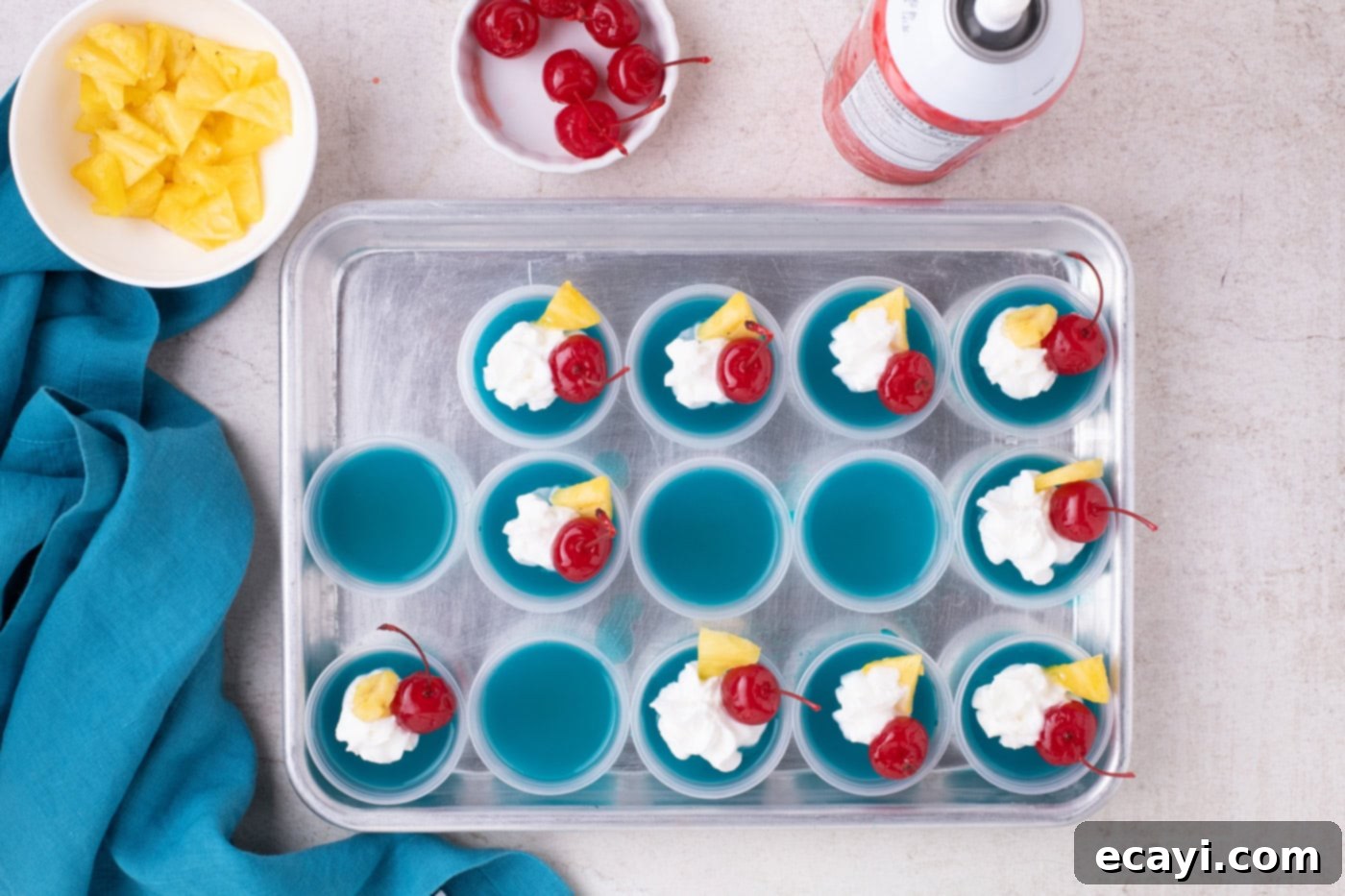 Blue Lagoon Jello Shooters 8 blue hawaiian jello shots with whipped cream, cherries, and pineapple