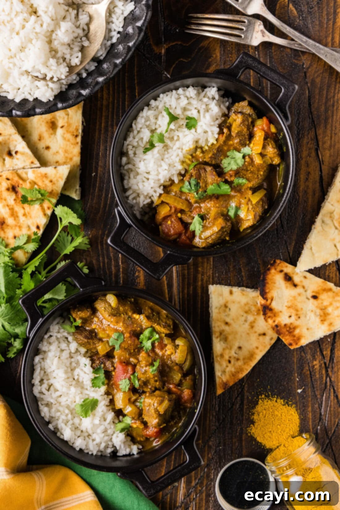Tender Beef Curry 2 Two bowls of Easy Stovetop Beef Curry served with fluffy white rice, garnished with fresh cilantro