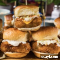 Crispy Fish Sliders 10 Close up photo of three Fish Sliders stacked up