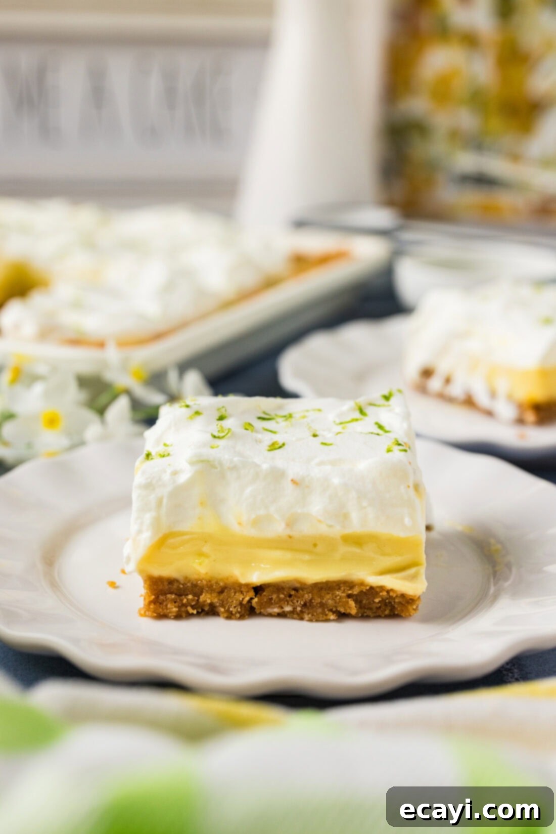 Tangy Key Lime Dessert Bars 3 Slice of Key Lime Slab Pie on a plate